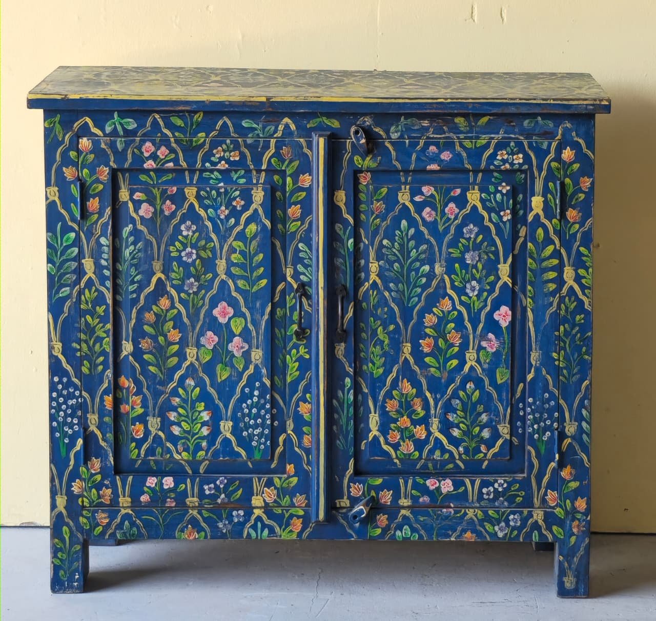 Dvar Peti Saheli — Sideboard of the Companion Door (Warm ochre-teak with painted folk panels) - Image 1